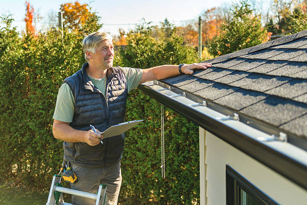 Professional Commercial Roofing technician working in Dedham, MA
